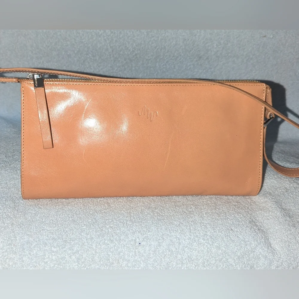 Monsac tan leather bag.